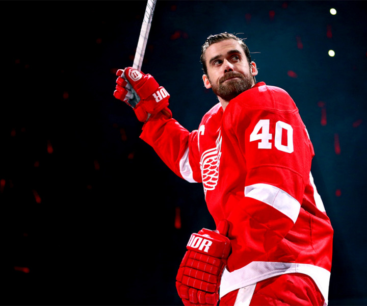 DETROIT, MI - JANUARY 22: Henrik Zetterberg #40 of the Detroit Red Wings salutes the fans as he is introduced for his first home game as the Red Wings captain prior to playing the Dallas Stars at Joe Louis Arena on January 22, 2013 in Detroit, Michigan. (Photo by Gregory Shamus/Getty Images)