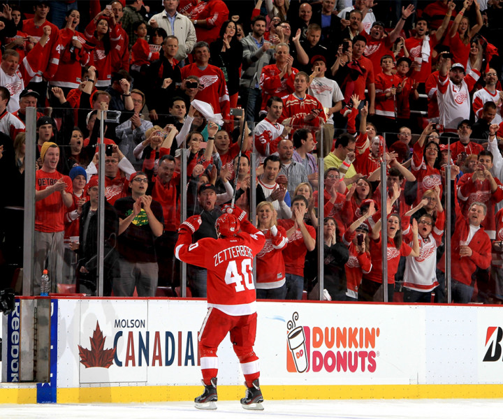 DETROIT, MI - MAY 10:  Henrik Zetterberg #40 of the Detroit Red Wings pumps his hands to the home town crowd after being named the first star of the game after Game Six of the Western Conference Quarterfinals against the Anaheim Ducks during the 2013 NHL Stanley Cup Playoffs at Joe Louis Arena on May 10, 2013 in Detroit, Michigan.  Detroit defeated Anaheim 4-3 in overtime  (Photo by Dave Reginek/NHLI via Getty Images)