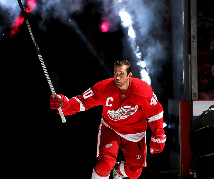 DETROIT, MI - OCTOBER 2: Henrik Zetterberg #40 of the Detroit Red Wings skates onto the ice after being introduced for the pre-game ceremonies before an NHL game against the Buffalo Sabres at Joe Louis Arena on October 2, 2013 in Detroit, Michigan. The Wings won 2-1 (Photo by Dave Reginek//NHLI via Getty Images)