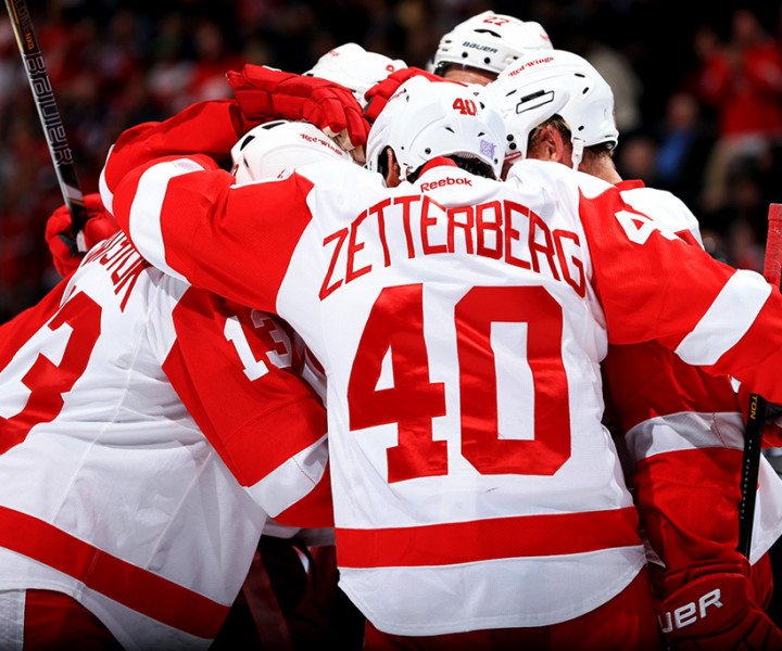 DENVER, CO - OCTOBER 17:  Henrik Zetterberg #40 of the Detroit Red Wings and his teammates celebrate an insurance goal by Pavel Datsyuk #13 of the Detroit Red Wings against the Colorado Avalanche in the thrid period at Pepsi Center on October 17, 2013 in Denver, Colorado. The Red Wings defeated the Avalanche 4-2.  (Photo by Doug Pensinger/Getty Images)